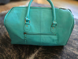 Western Cowhide & Tooled Leather Carry-On Duffle with Turquoise Fringe